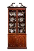 A GEORGE III MAHOGANY BOOKCASE, IN THE MANNER OF WILLIAM BRADSHAW, CIRCA 1780