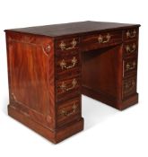 A GEORGE III MAHOGANY KNEEHOLE DESK, CIRCA 1780