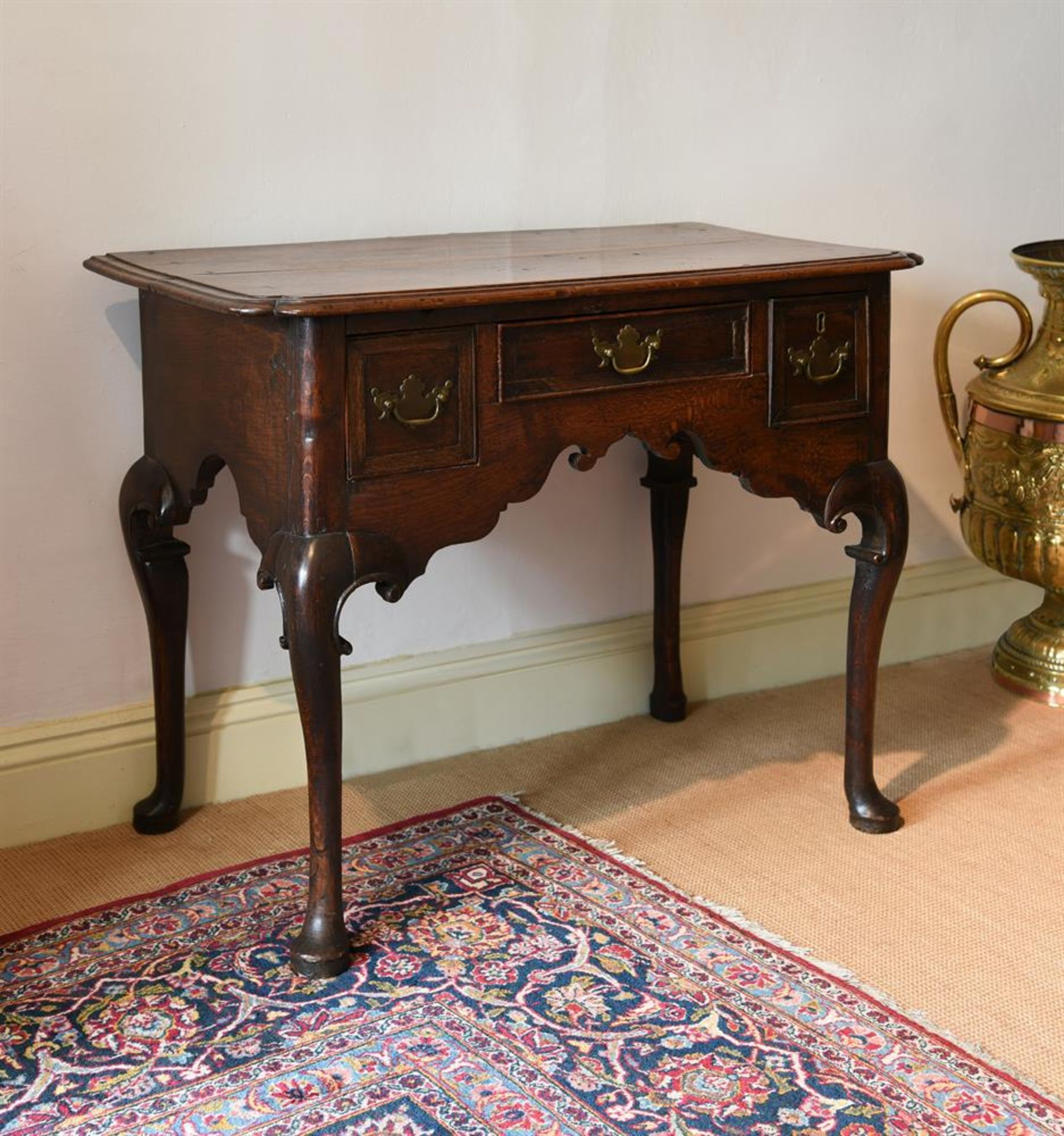 AN OAK AND CROSSBANDED SIDE TABLE, SECOND QUARTER 18TH CENTURY