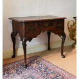 AN OAK AND CROSSBANDED SIDE TABLE, SECOND QUARTER 18TH CENTURY