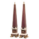 A PAIR OF ORMOLU MOUNTED RED PORPHYRY AND WHITE MARBLE OBELISKS, 19TH CENTURY AND LATER MOUNTED