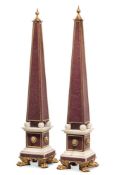 A PAIR OF ORMOLU MOUNTED RED PORPHYRY AND WHITE MARBLE OBELISKS, 19TH CENTURY AND LATER MOUNTED