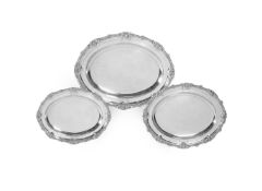 A GEORGE III SET OF THREE SILVER GRADUATED OVAL MEAT PLATES, PAUL STORR, LONDON 1811