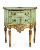 AN ITALIAN GREEN PAINTED, GILTWOOD AND POLYCHROME DECORATED COMMODE, 19TH/EARLY 20TH CENTURY