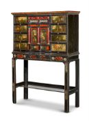 Y Y A FLEMISH EBONY, TORTOISESHELL, PAINTED AND GILT METAL MOUNTED CABINET ON STAND
