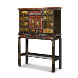 Y Y A FLEMISH EBONY, TORTOISESHELL, PAINTED AND GILT METAL MOUNTED CABINET ON STAND