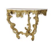 AN ITALIAN CARVED GILTWOOD SERPENTINE CONSOLE TABLE, 18TH CENTURY