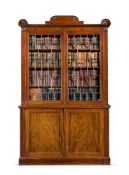 A REGENCY MAHOGANY BOOKCASE, IN THE MANNER OF GEORGE BULLOCK, CIRCA 1820