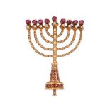 AN 18 CARAT GOLD RUBY AND DIAMOND MENORAH BROOCH