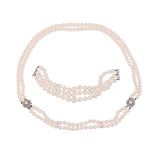 A THREE ROW CULTURED PEARL BRACELET WITH DIAMOND CLASP