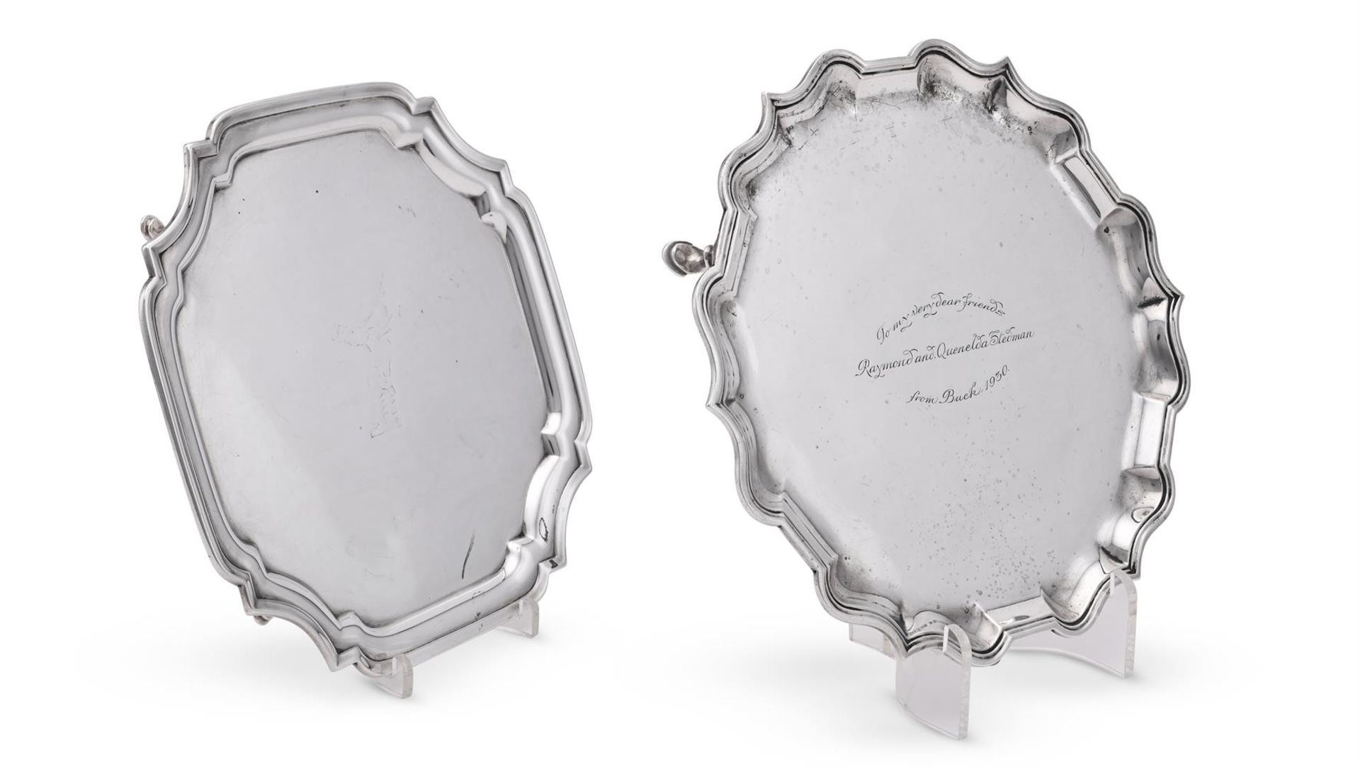 AN EDWARDIAN SILVER SHAPED CIRCULAR SALVER