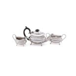 A SILVER THREE PIECE OVAL BALUSTER TEA SET