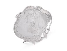 A GEORGE III SILVER SHAPED OVAL TEAPOT STAND