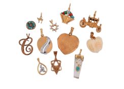 A COLLECTION OF CHARMS AND PENDANTS
