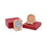 CARTIER, REF. 7517, A GILT METAL AND CREAM ENAMEL DESK ALARM CLOCK