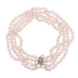 A DIAMOND AND CULTURED PEARL NECKLACE