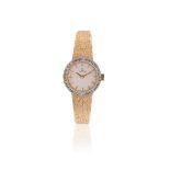 OMEGA, REF. 7244, A LADY'S 18 CARAT GOLD COLOURED AND DIAMOND BRACELET WATCH