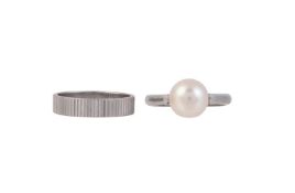A CULTURED PEARL RING AND A STRIATED BAND RING