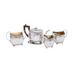 A GEORGE III SILVER FIVE PIECE OBLONG TEA SET