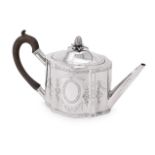 A GEORGE III SILVER SHAPED OVAL TEAPOT