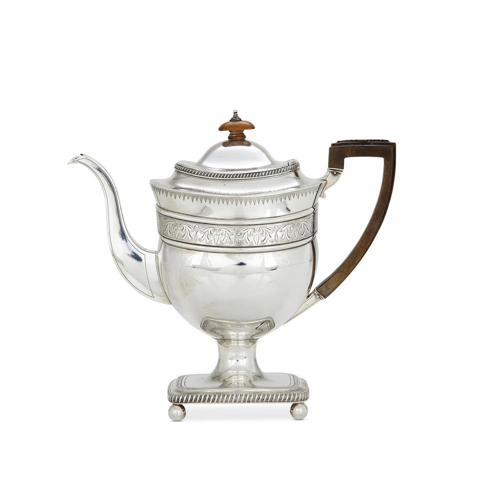 A GEORGE III SILVER OBLONG PEDESTAL TEA POT