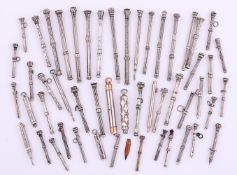 A COLLECTION OF SILVER COLOURED PROPELLING PENCILS