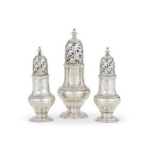 A SET OF THREE GEORGE II SILVER BALUSTER CASTERS