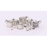 A COLLECTION OF SILVER MUSTARD POTS