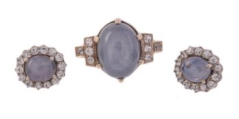 A STAR SAPPHIRE AND WHITE STONE RING AND CLUSTER EARRINGS