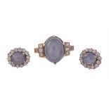 A STAR SAPPHIRE AND WHITE STONE RING AND CLUSTER EARRINGS