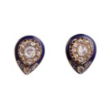 A PAIR OF ENAMEL AND DIAMOND EAR STUDS