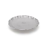 A SILVER SHAPED CIRCULAR SALVER