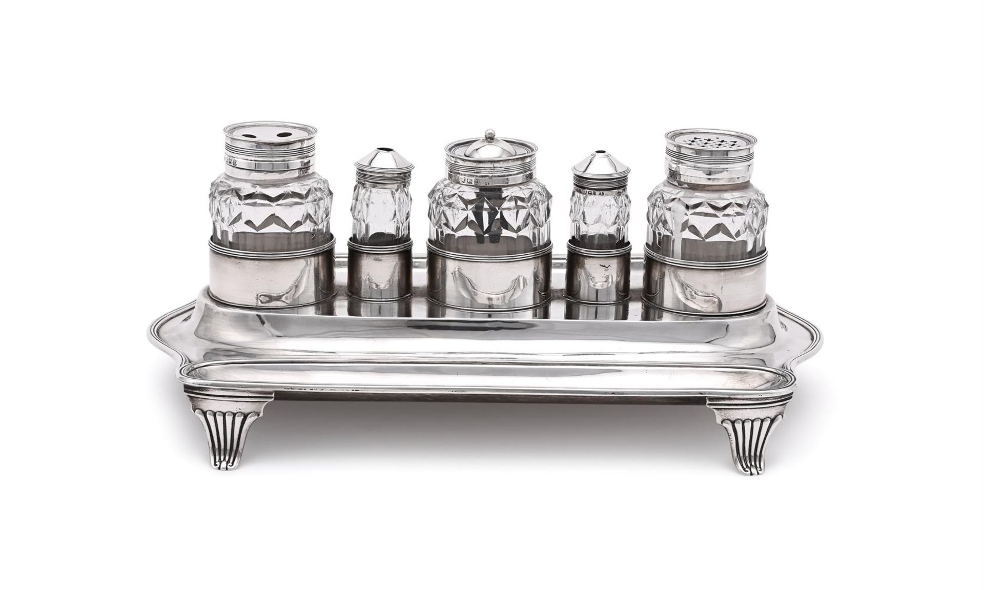 A GEORGE III SILVER SHAPED OBLONG INKSTAND