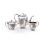 A THAI SILVER COLOURED THREE PIECE TEA SET