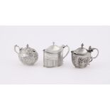 THREE SILVER OVAL MUSTARD POTS