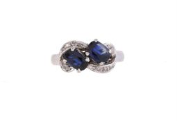 A TWO STONE SAPPHIRE RING
