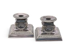 A PAIR OF AMERICAN SILVER SOLDERED CANDLESTICKS