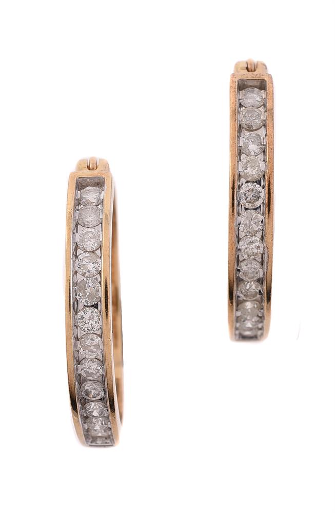 A PAIR OF DIAMOND HOOPED EARRINGS