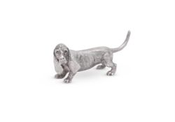 A SILVER MODEL OF A BASSET HOUND