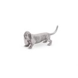 A SILVER MODEL OF A BASSET HOUND