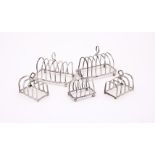 FIVE SILVER TOAST RACKS