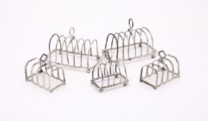 FIVE SILVER TOAST RACKS