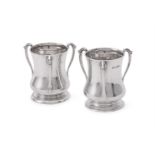 A MATCHED PAIR OF SILVER ART NOUVEAU THREE HANDLED VASES