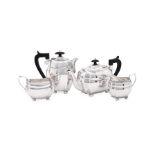 Y A VICTORIAN SILVER FOUR PIECE OBLONG BALUSTER TEA SET