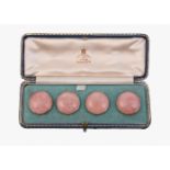 A SET OF FOUR EARLY 20TH CENTURY ROSE QUARTZ BUTTONS