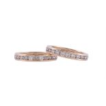 A PAIR OF DIAMOND ETERNITY RINGS