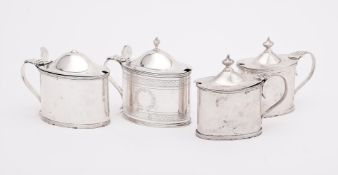 FOUR SILVER OVAL MUSTARD POTS