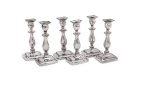 A MATCHED SET OF SIX DUTCH SILVER CANDLESTICKS