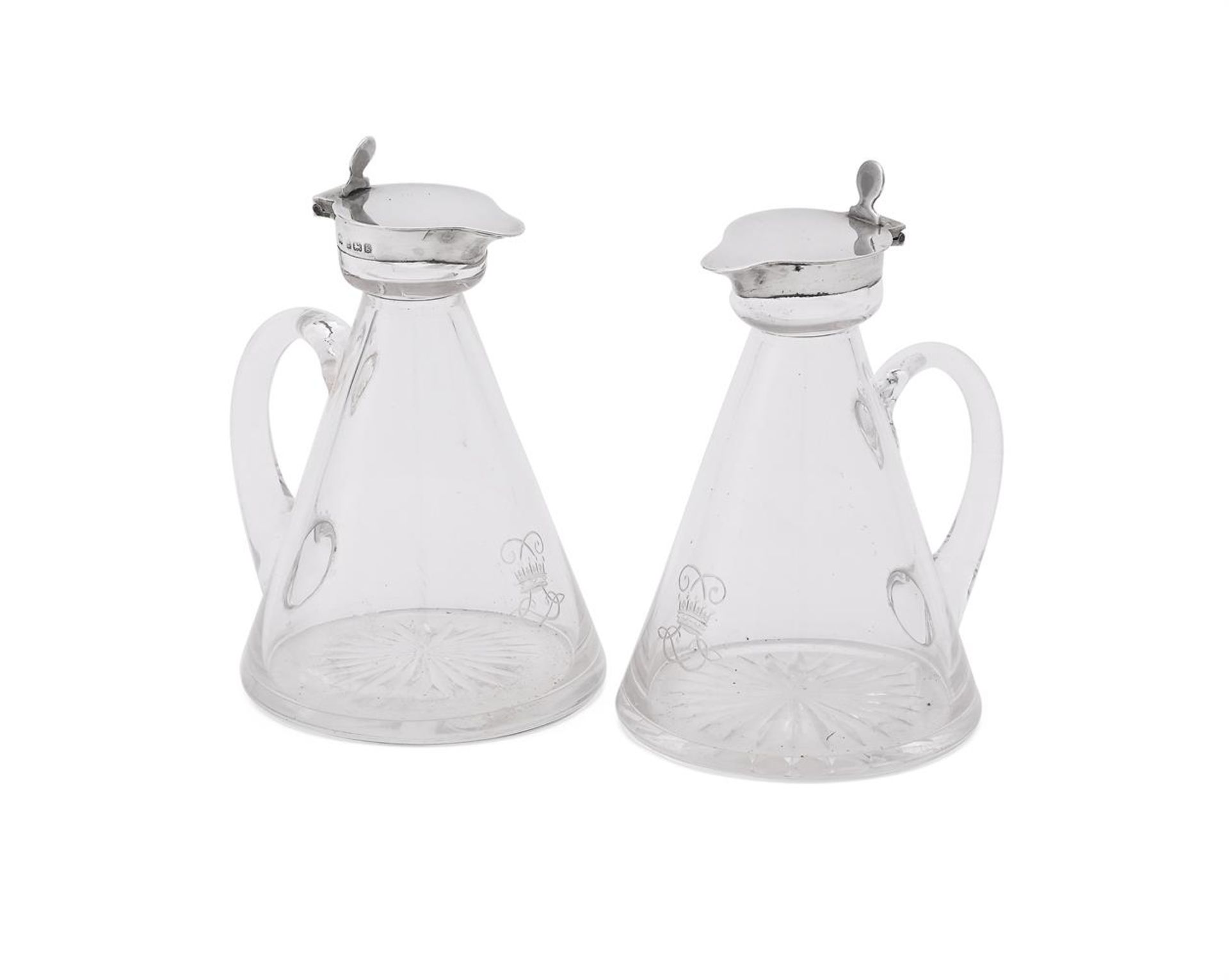 A PAIR OF EDWARDIAN SILVER MOUNTED WHISKEY NOGGINS