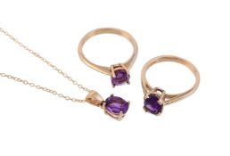 TWO AMETHYST RINGS AND AN AMETHYST PENDANT
